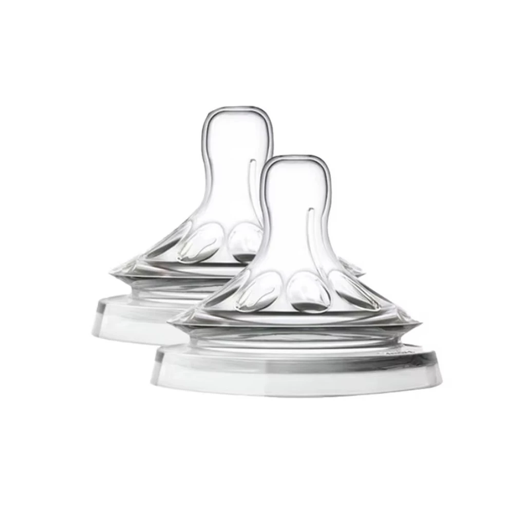 bico-mamadeira-philip-avent Dois bicos de silicone transparentes da linha Philips Avent Pétala, destacando o formato largo e o design interno com ranhuras em formato de pétalas.